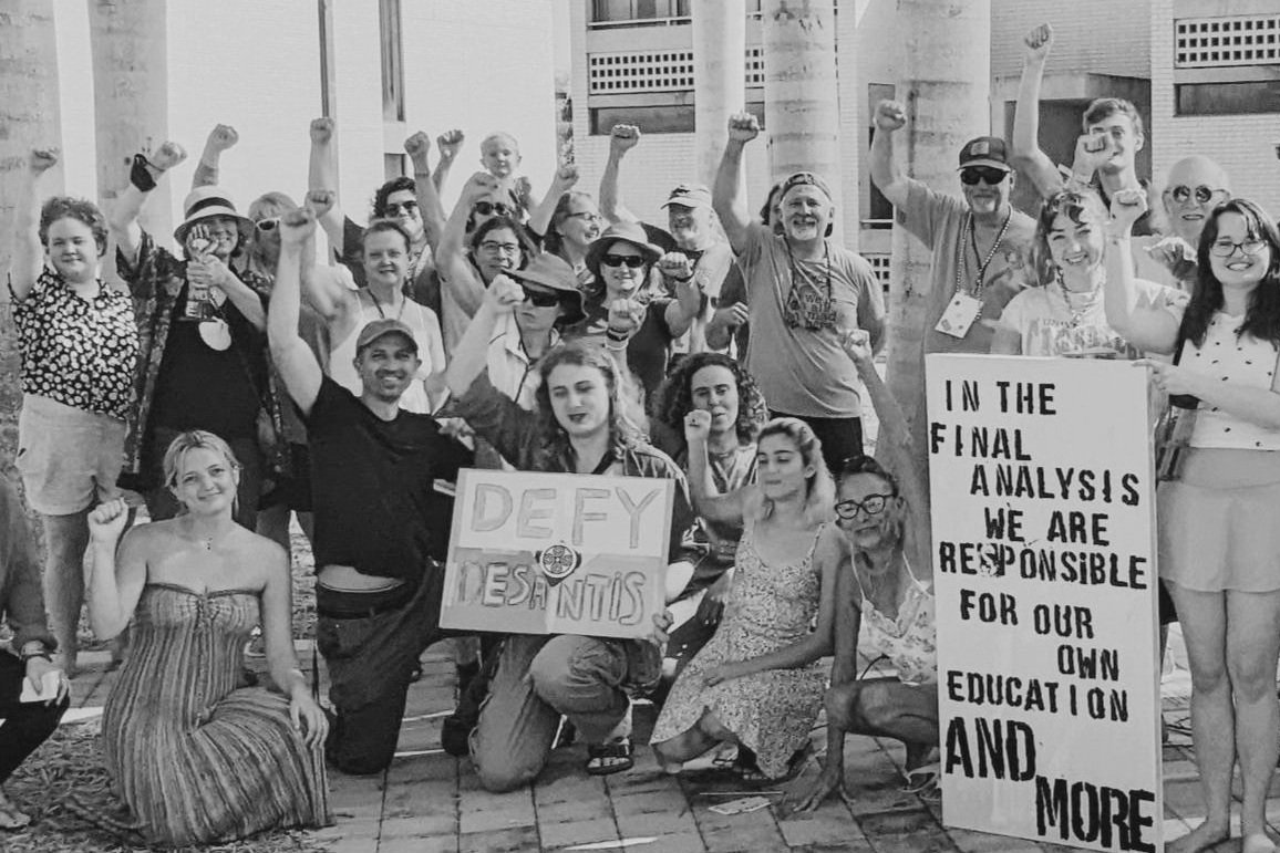 AltLibArts students protesting with signs 